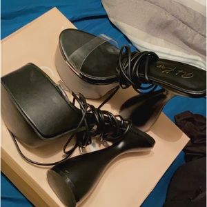 Black high heels more like stilettos